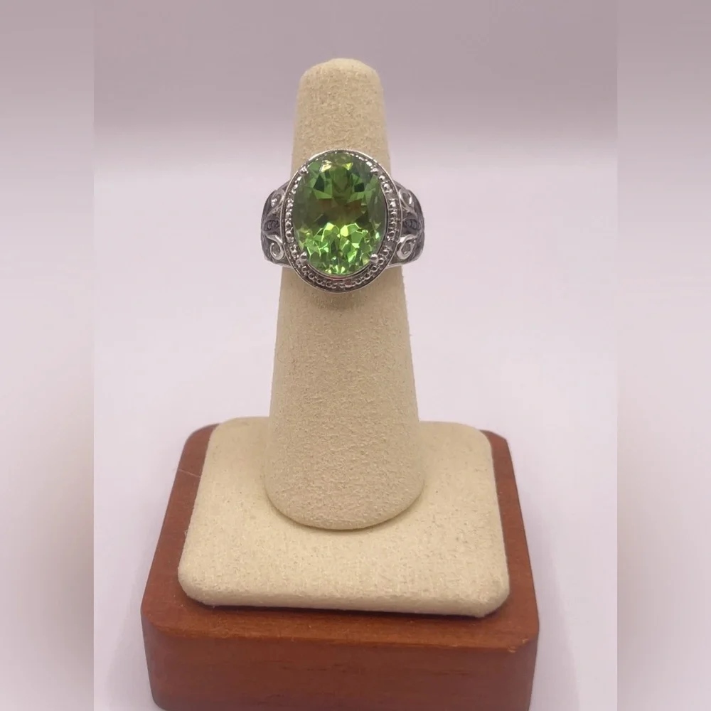 Simulated peridot in sterling silver with black rhinestone accents